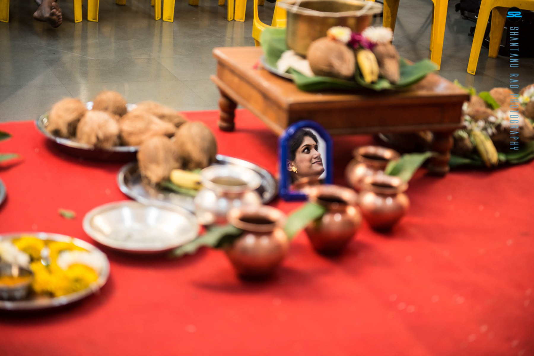 Red ritual details with copper pots